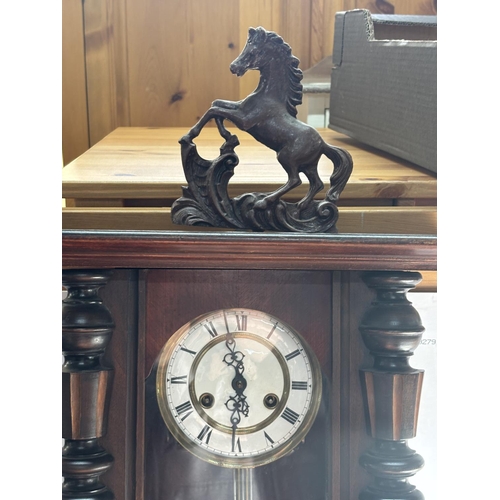 348 - Wall clock with Horse on top