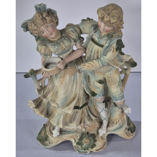 359 - Large mid 19thC unmarked, central European bisque porcelain figurine depicting a couple on a bench