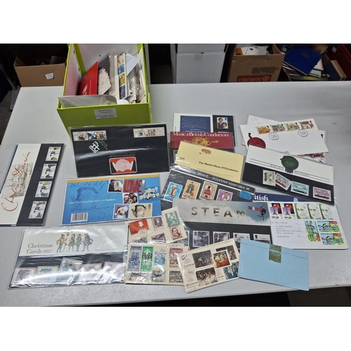 53 - Box of various stamps and old postcards, stamps include British stamp packs, some FDC and some mixed... 