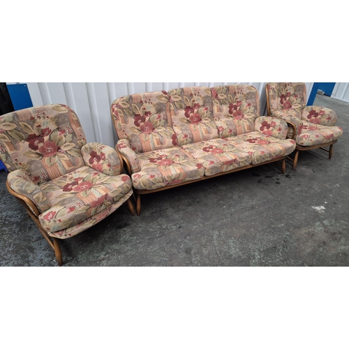 482 - Ercol three piece suite comprising 3 seat sofa and 2 armchairs, all with matching, original cushions