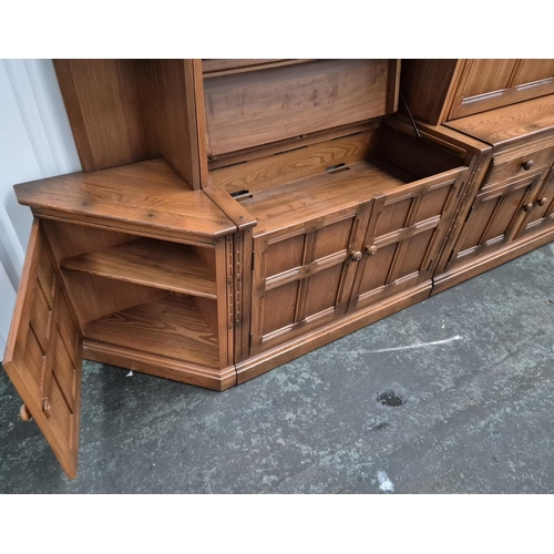 483 - Large Ercol sideboard with glazed cabinets in 2 parts together with a small triangualar corner end