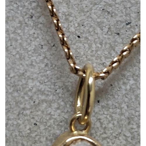 7 - Superb 18ct yellow gold and 18ct yellow gold pendent with 2 natural pearls,

10.1 grams gross