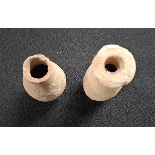 54 - Two small Roman terracotta jars, one with a flared rim (2),

The largest measures 8cm tall