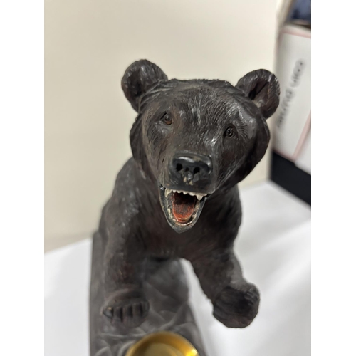 76 - Large, antique Black Forest Bear on its hind legs about a gilt metal bowl cut into the base,

28 cm ... 