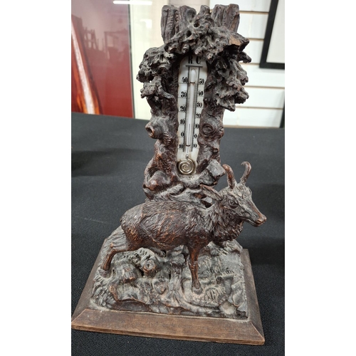 78 - Antique Black Forest carving of a Deer before an old tree stump which incorporates a barometer,

28c... 