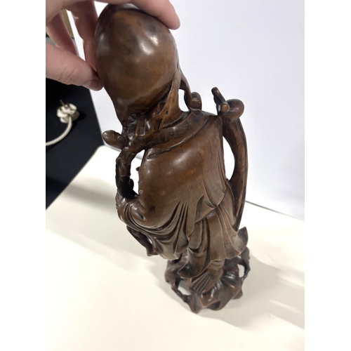 89 - Large 19thC Chinese root carving depicting an emancipated old scholar,

The carving is approx 40cm t... 