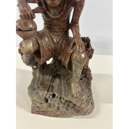 90 - Fine quality 19thC Chinese soapstone carving of a squatting man,

The carving measures approx 17cm t... 