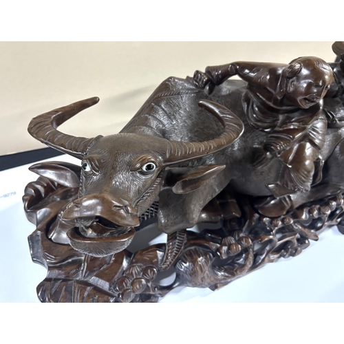 92 - Stunning, large, detailed 19thC hardwood carving of 2 Chinese men riding on the back of a water Buff... 