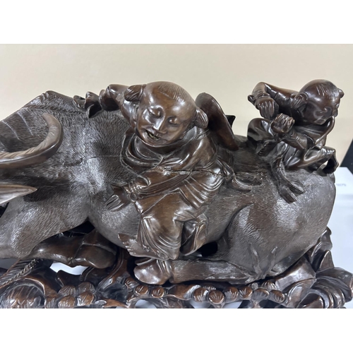 92 - Stunning, large, detailed 19thC hardwood carving of 2 Chinese men riding on the back of a water Buff... 