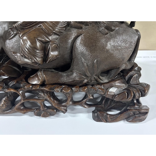 92 - Stunning, large, detailed 19thC hardwood carving of 2 Chinese men riding on the back of a water Buff... 