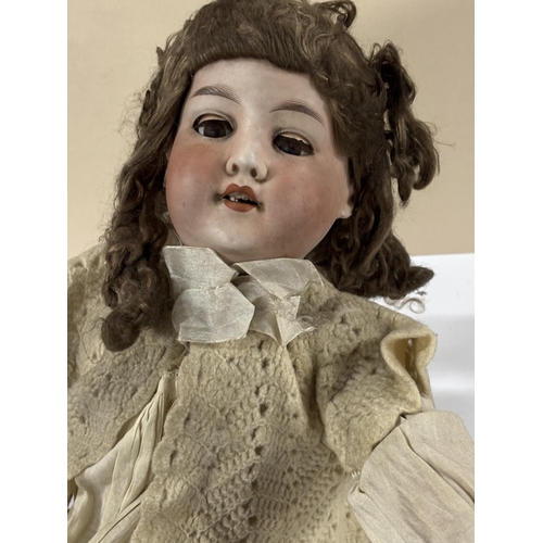 94 - Large antique porcelain doll made by DRGM, (Deutches Reichs Gebrauchs Muster) Germany, possibly with... 