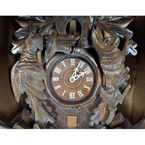 100 - Large, ornate, early 20thC Black Forrest cuckoo clock