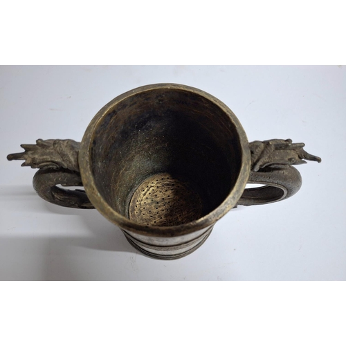 106 - Unusual, heavy, antique Chinese brass two handled pot with holes to base and Dragon decorated handle... 