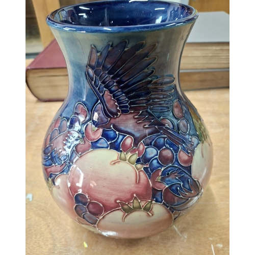 284 - Fine, large bulbus Moorcroft vase with fruit and bird decoration,

24cm tall