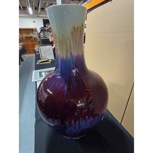 282 - Very Large and heavy vase with multi colours, flambe style, unsure on maker 

86cm x 60cm