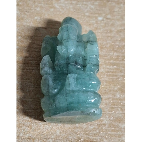 275 - 30 carat Columbian Emerald carved Hindu God