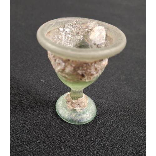 47 - Fine quality, complete Roman iridescent glass egg-cup style holder with flared rim together with an ... 