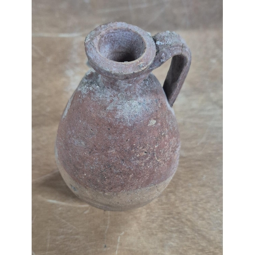 50 - Roman terracotta free-standing amphora/jug,

14cm tall