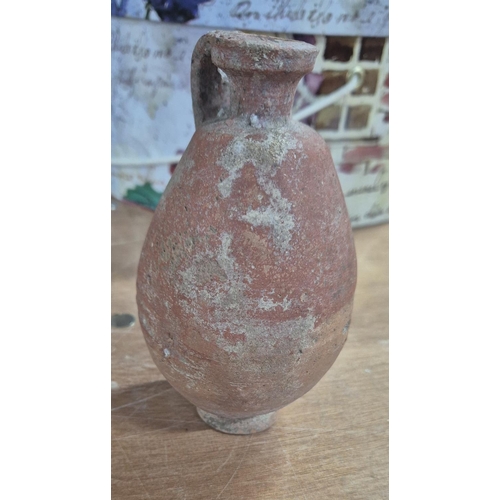 50 - Roman terracotta free-standing amphora/jug,

14cm tall