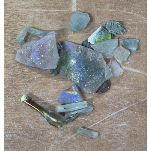 64 - Quantity of Roman iridescent glass pieces (Qty)