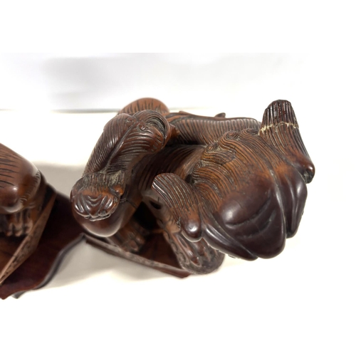 88 - Pair of antique Chinese root carvings depicting two Foo dogs (2),

Both carvings measure approx 16 x... 