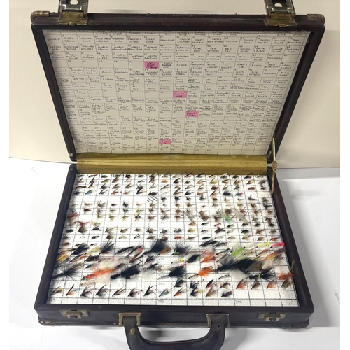 141 - Case containing over 200 different wet and dry flies, nymphs, lures and sea Trout flies with a compr... 