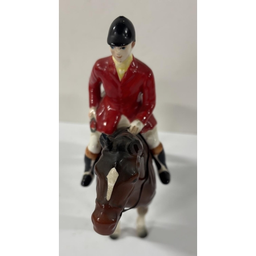 187 - Beswick huntsman on brown horse