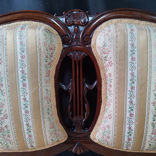 216 - Antique floral upholstered loveseat