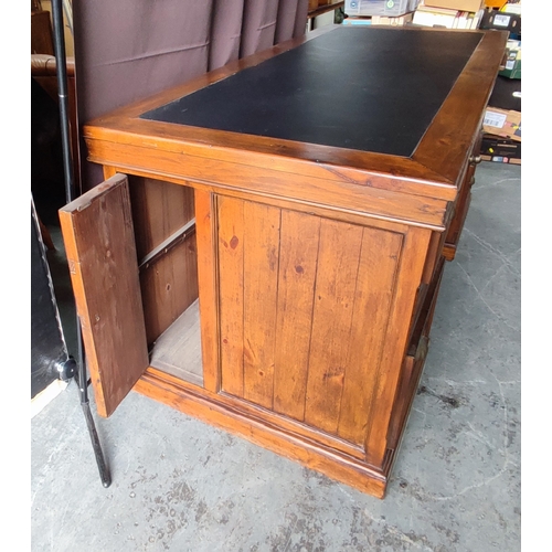 219 - Reclaimed, large pedestal desk with black leather top, three writing slopes above six drawers withe ... 