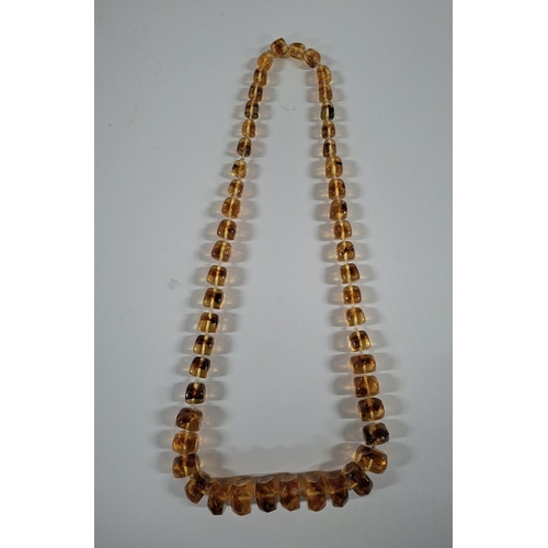 35 - Antique, early 20thC Baltic Amber ladies string necklace with large graduating chunks of Baltic Ambe... 