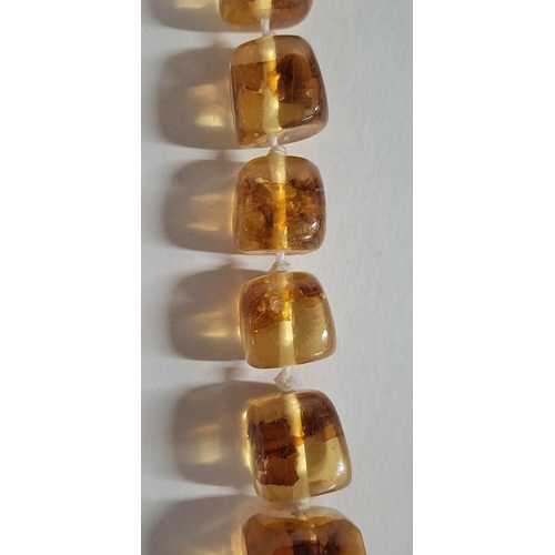 35 - Antique, early 20thC Baltic Amber ladies string necklace with large graduating chunks of Baltic Ambe... 