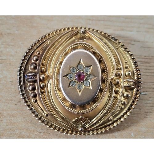 36 - Fine quality antique 9ct gold brooch with 8 small central round cut diamonds surrounding a slightly ... 