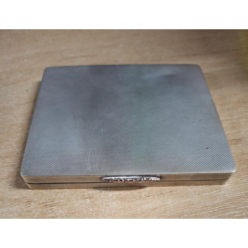 5 - A hallmarked 1966 Birmingham silver cigarette case with engine turned gilt interior,

approx 134 gra... 
