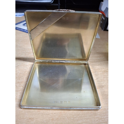 5 - A hallmarked 1966 Birmingham silver cigarette case with engine turned gilt interior,

approx 134 gra... 