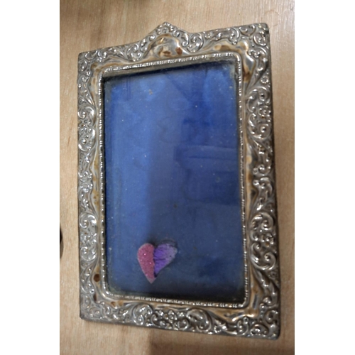 9 - Two early 20thC stylish, hallmarked silver fronted photo frames (2)