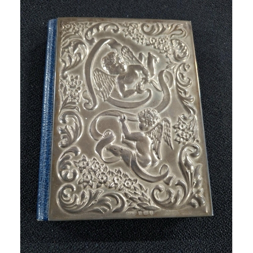 15 - Superb ornately decorated fronted bible, the frontage decorated in Putti and scrolling decoration in... 