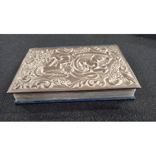 15 - Superb ornately decorated fronted bible, the frontage decorated in Putti and scrolling decoration in... 