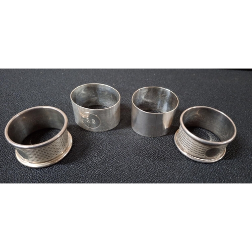 23 - Pair of Birmingham hallmarked silver napkin rings with engine turned decoration together with 2 othe... 