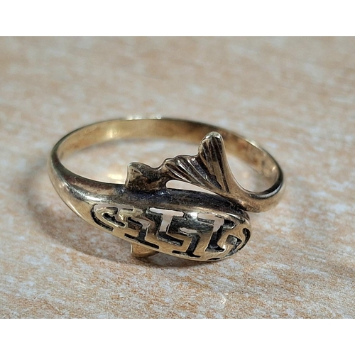 37 - Indistinctly stamped gold metal Greek key, Dolphin ring,

Please note - The vendor purchased the rin... 