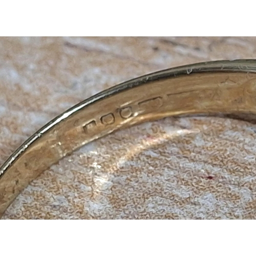 40 - 9ct yellow gold ring with a large CZ and smaller stones to both shoulders, 

3 grams gross