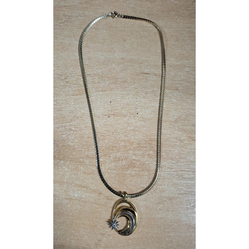 33 - Ladies fine quality silver gilt necklace and large silver gilt oval modernist pendant,