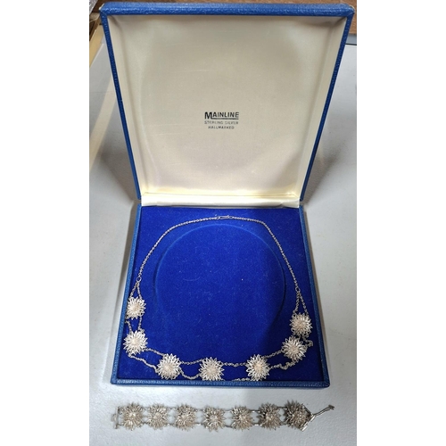 43 - Stunning quality, ladies unmarked silver coloured ornate metal necklace with matching bracelet in pr... 