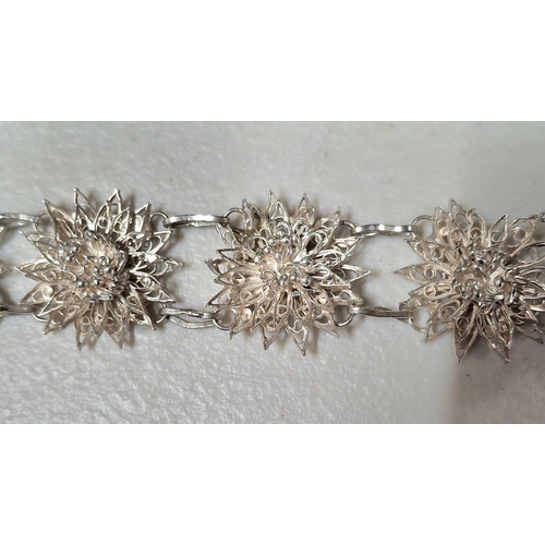 43 - Stunning quality, ladies unmarked silver coloured ornate metal necklace with matching bracelet in pr... 