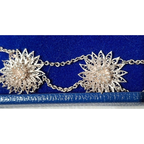 43 - Stunning quality, ladies unmarked silver coloured ornate metal necklace with matching bracelet in pr... 