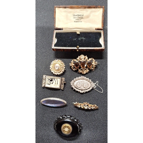 44 - Collection of seven antique brooches and an old jewellery box, the brooches include a jet mourning b... 