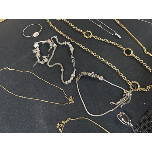 49 - Collection of chains some gold and silver coloured