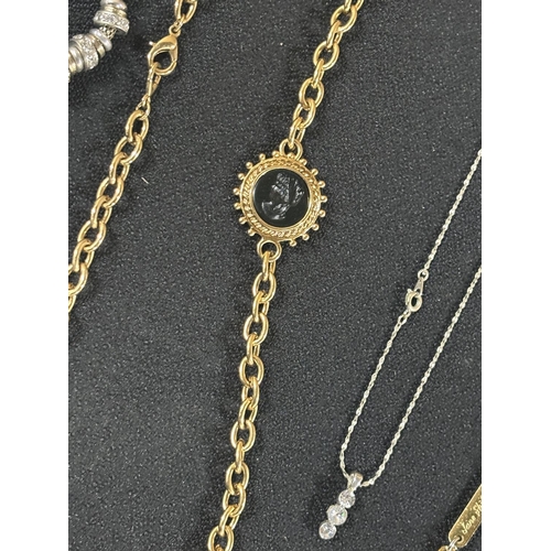 49 - Collection of chains some gold and silver coloured