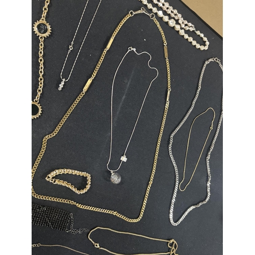 49 - Collection of chains some gold and silver coloured