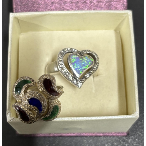 53 - 2 Silver 925 rings 1 boxed with Moonstone effect 

14.2g