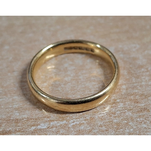 60 - Hallmarked 22ct yellow gold wedding band,

4.8 grams           size M